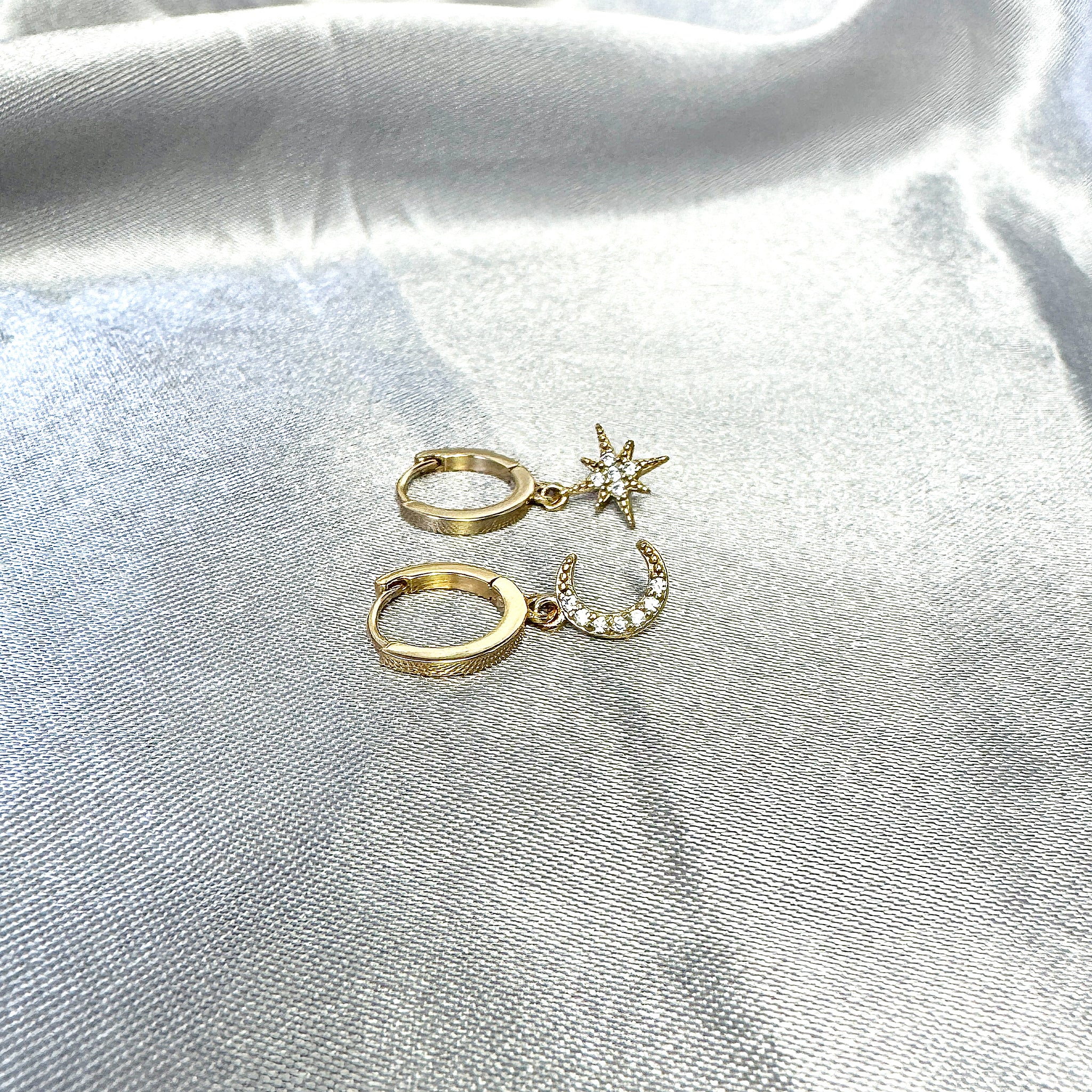 Five and Two Chloe Huggie Hoop Star Moon Charm Earrings in 14k Gold Plated