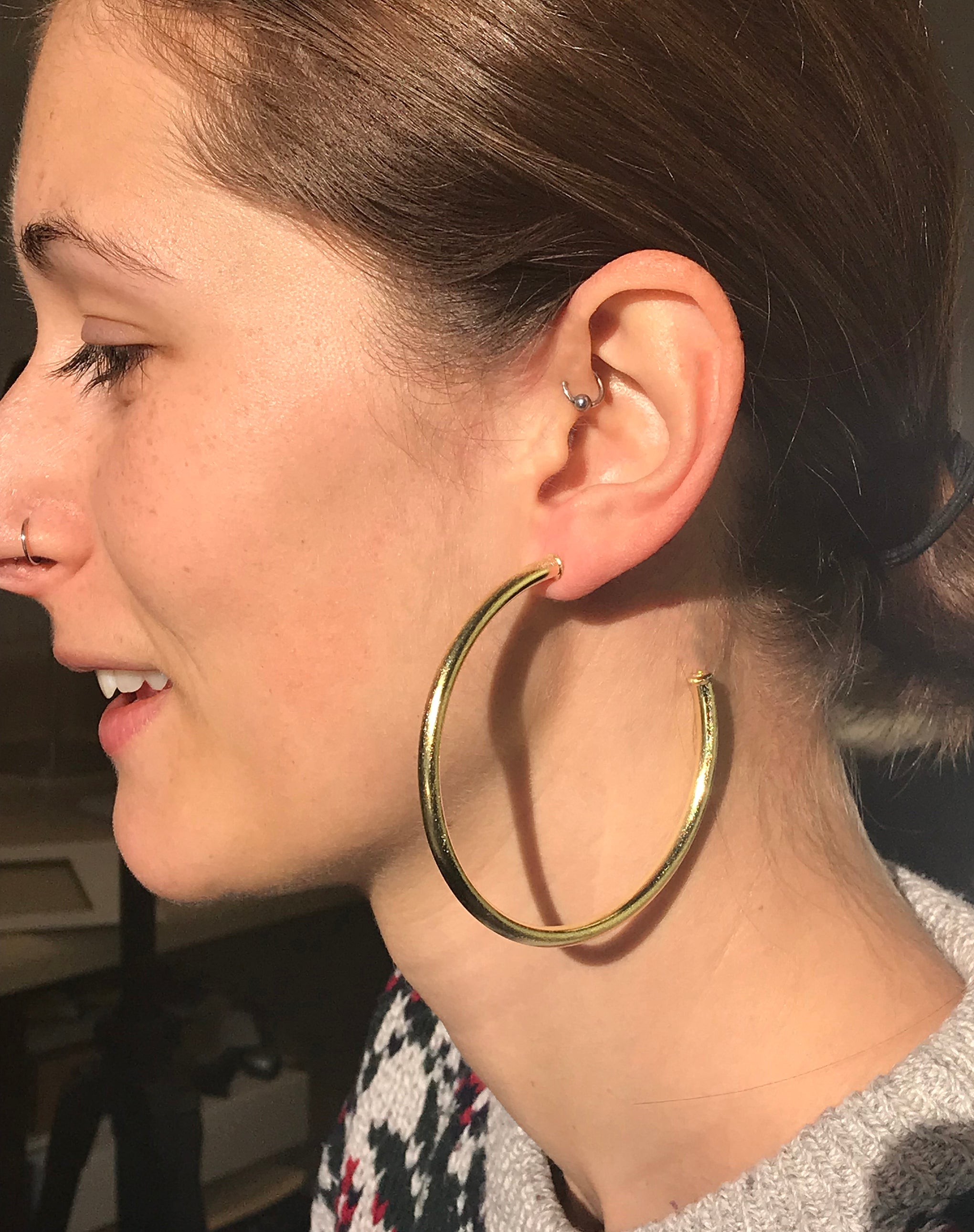 Model Wearing Sheila Fajl Liana Tubular Hoop Earrings in Gold
