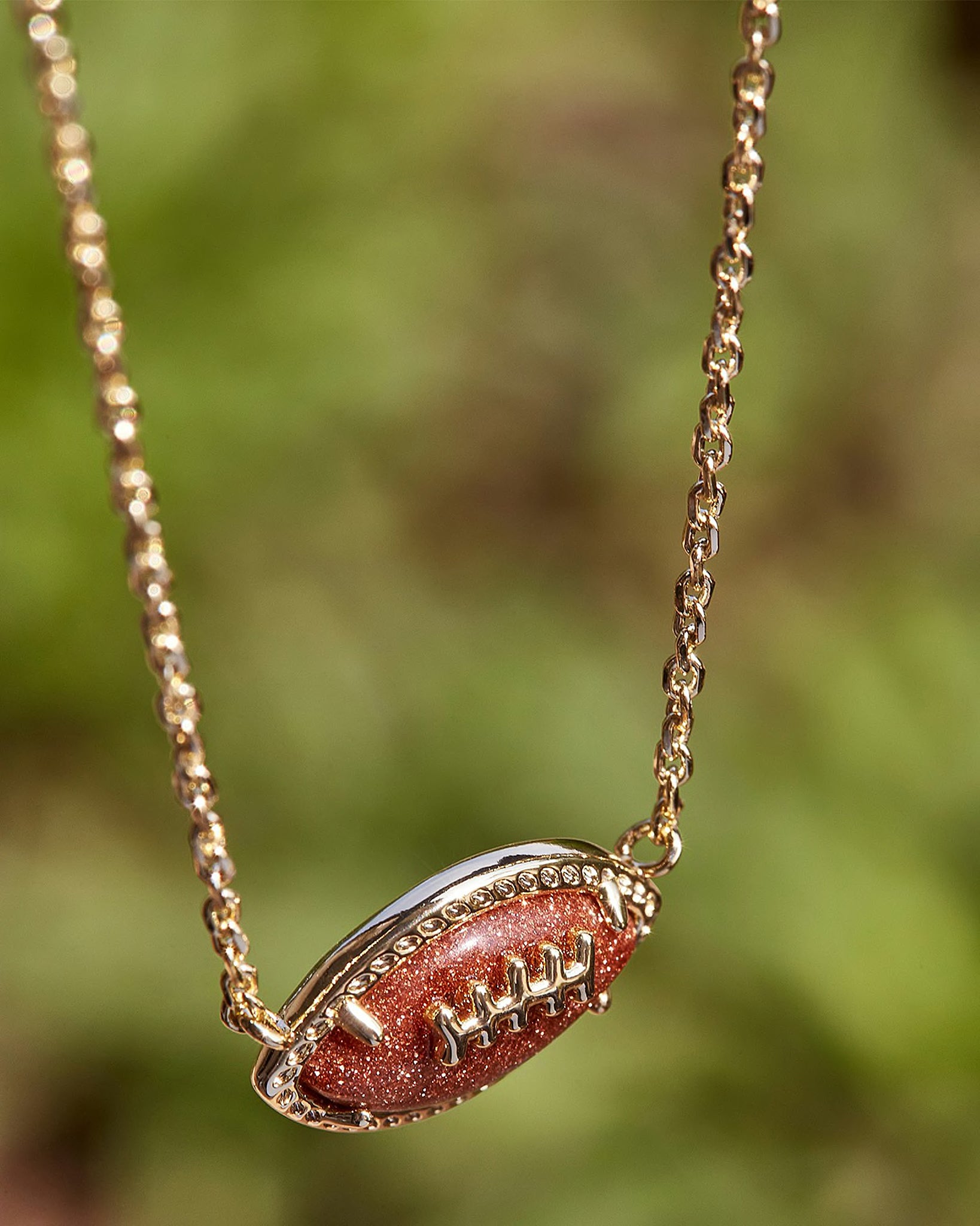 Kendra Scott Football Pendant Necklace in Orange Goldstone and Gold Plated