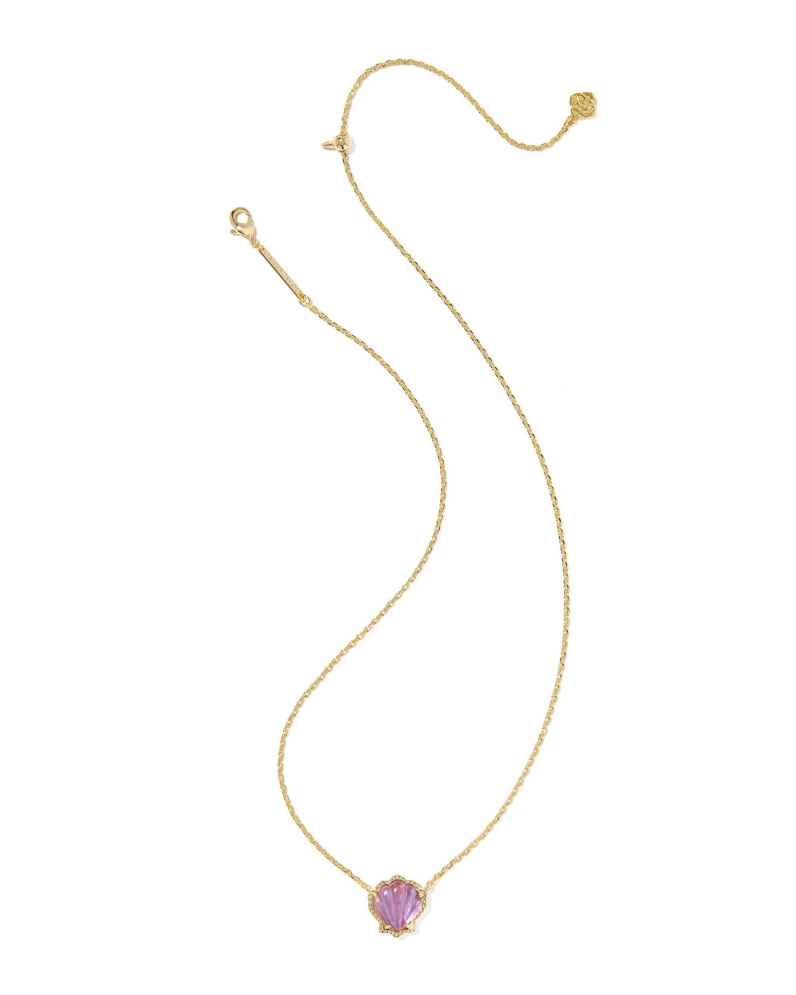 Gold necklace with a pink seashell pendant on a white background