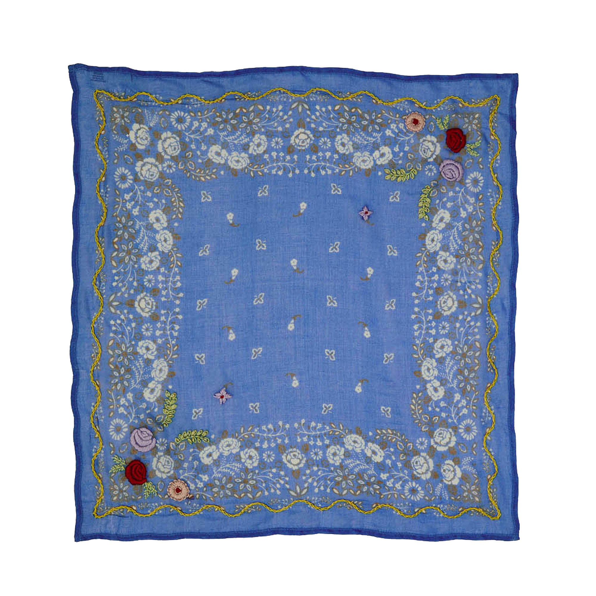 A square blue embroidered scarf with a floral border and gold detailing, laid flat against a white background.