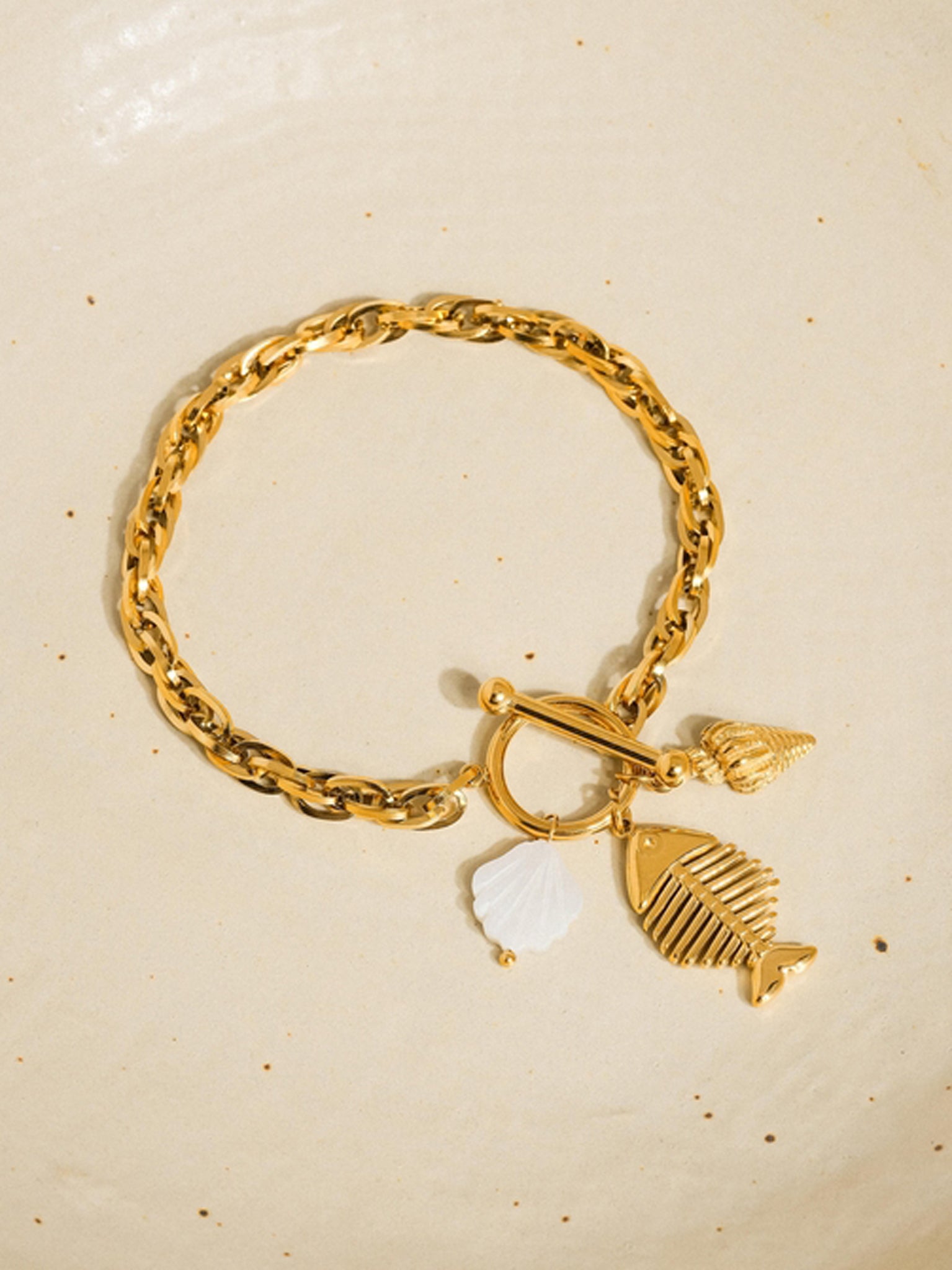 Flanerie Bone Fishbone Shell Charm Chain Bracelet in Gold Plated