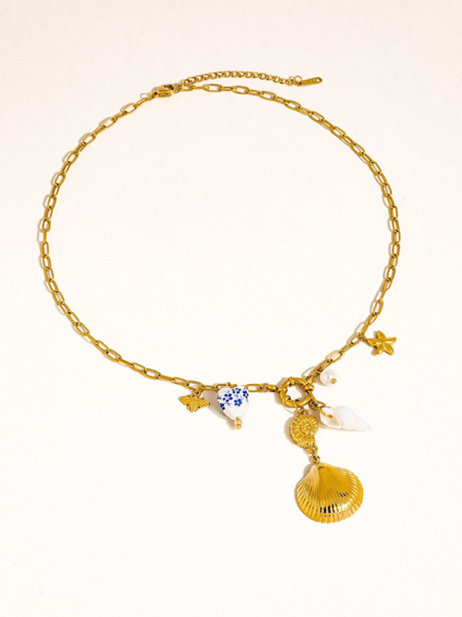 Flanerie Briar Blue Floral Ceramic Heart and Shell Statement Charm Necklace in Gold Plated