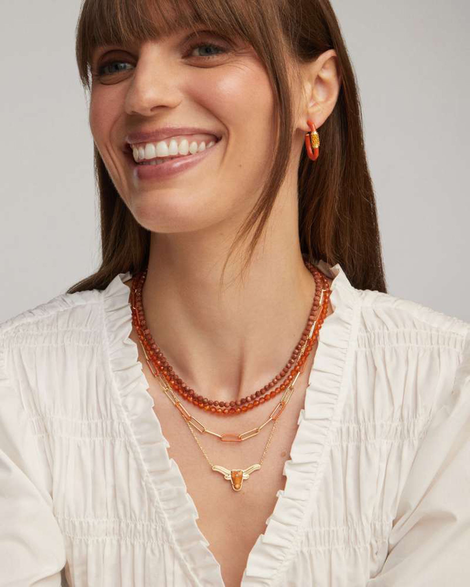 Kendra Scott Longhorn Short Pendant Necklace in Variegated Orange Magnesite and Gold Plated