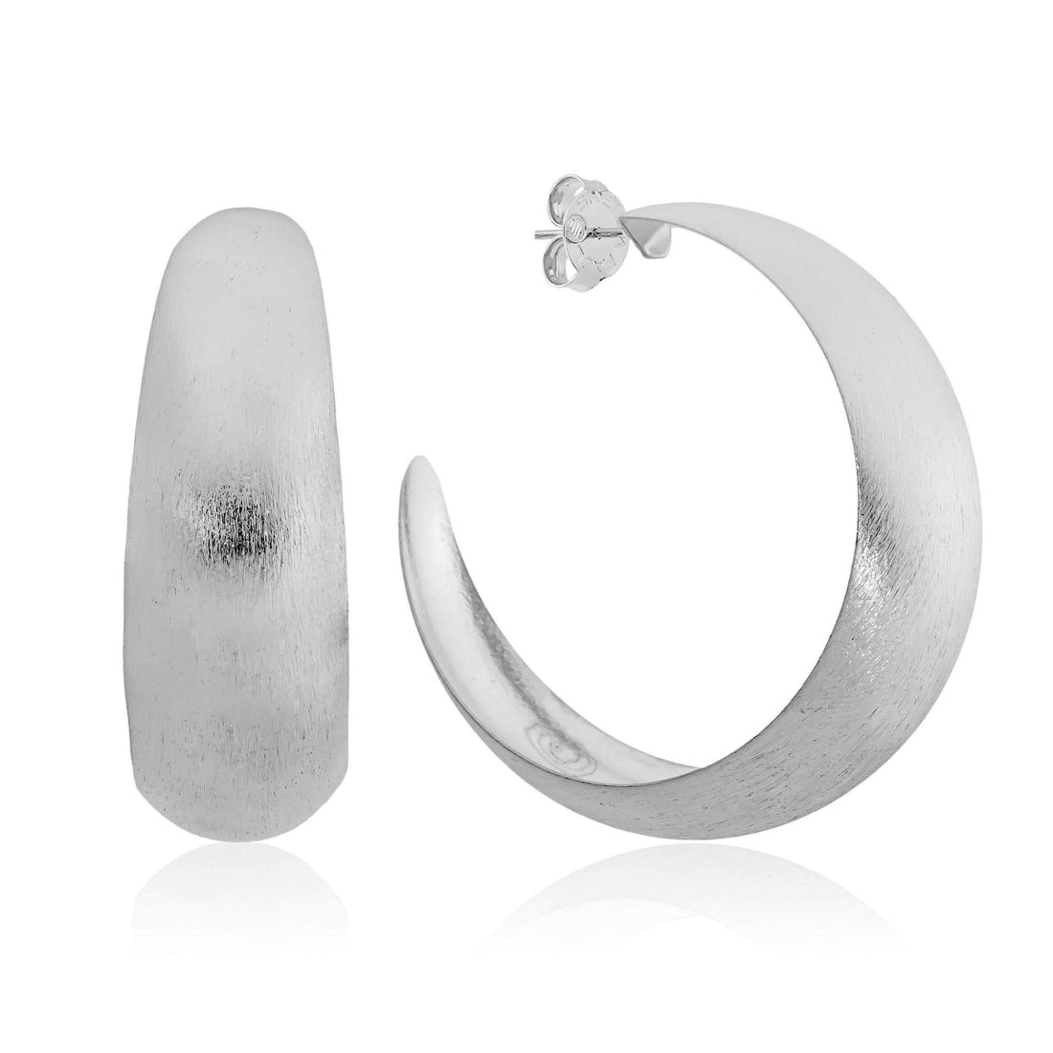 Silver hoop earrings on a white background