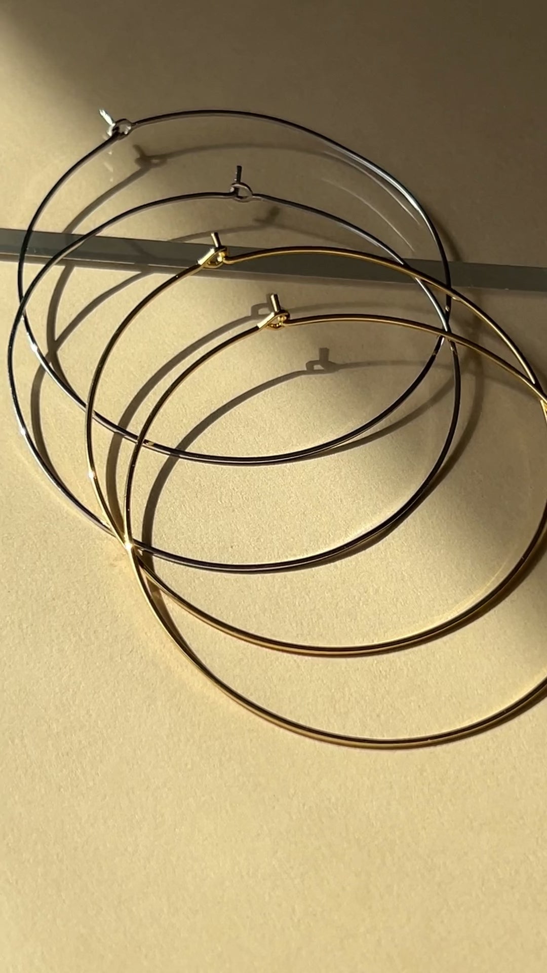 Luv Aj Capri Large Thin Wire Hoops Earrings in Polished Rhodium