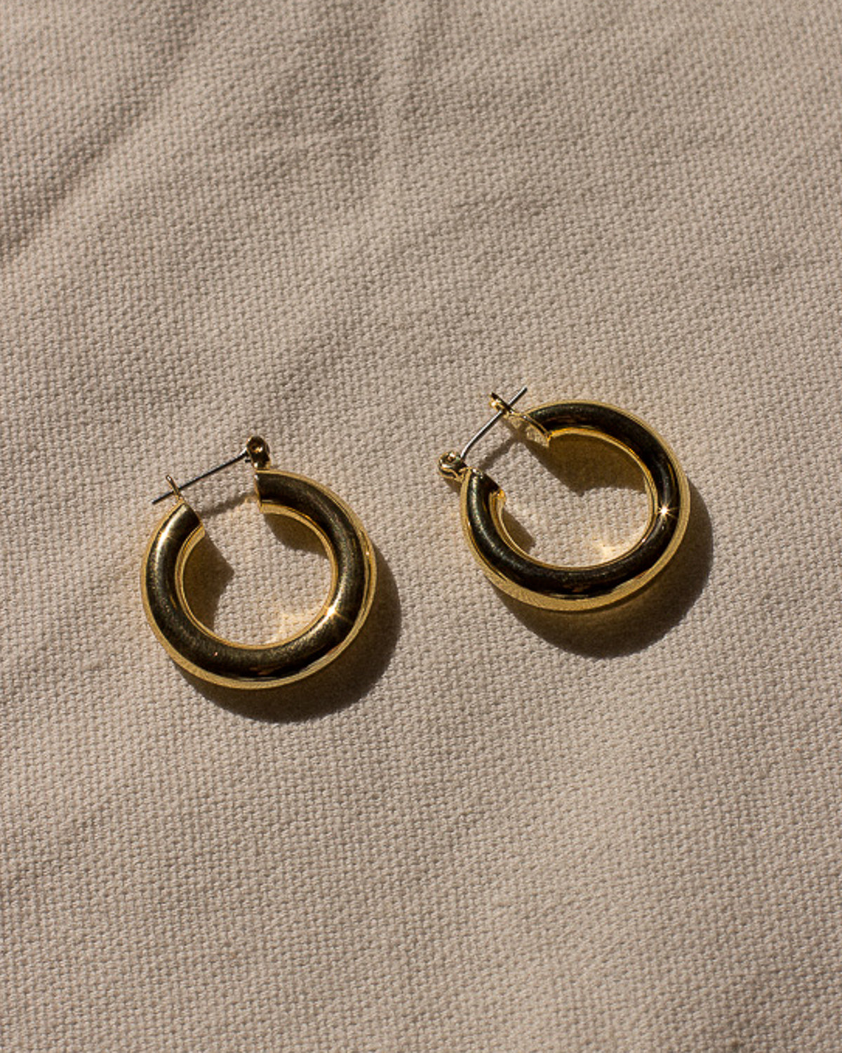 Luv Aj Baby Amalfi Tube Hoop Earrings in Polished 14k Antique Gold Plated