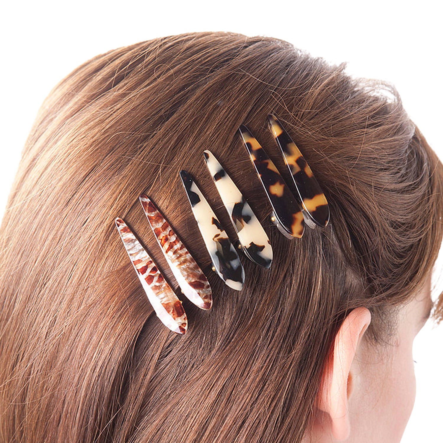 model wearing Ficcare Mini Maximas Hair Clips