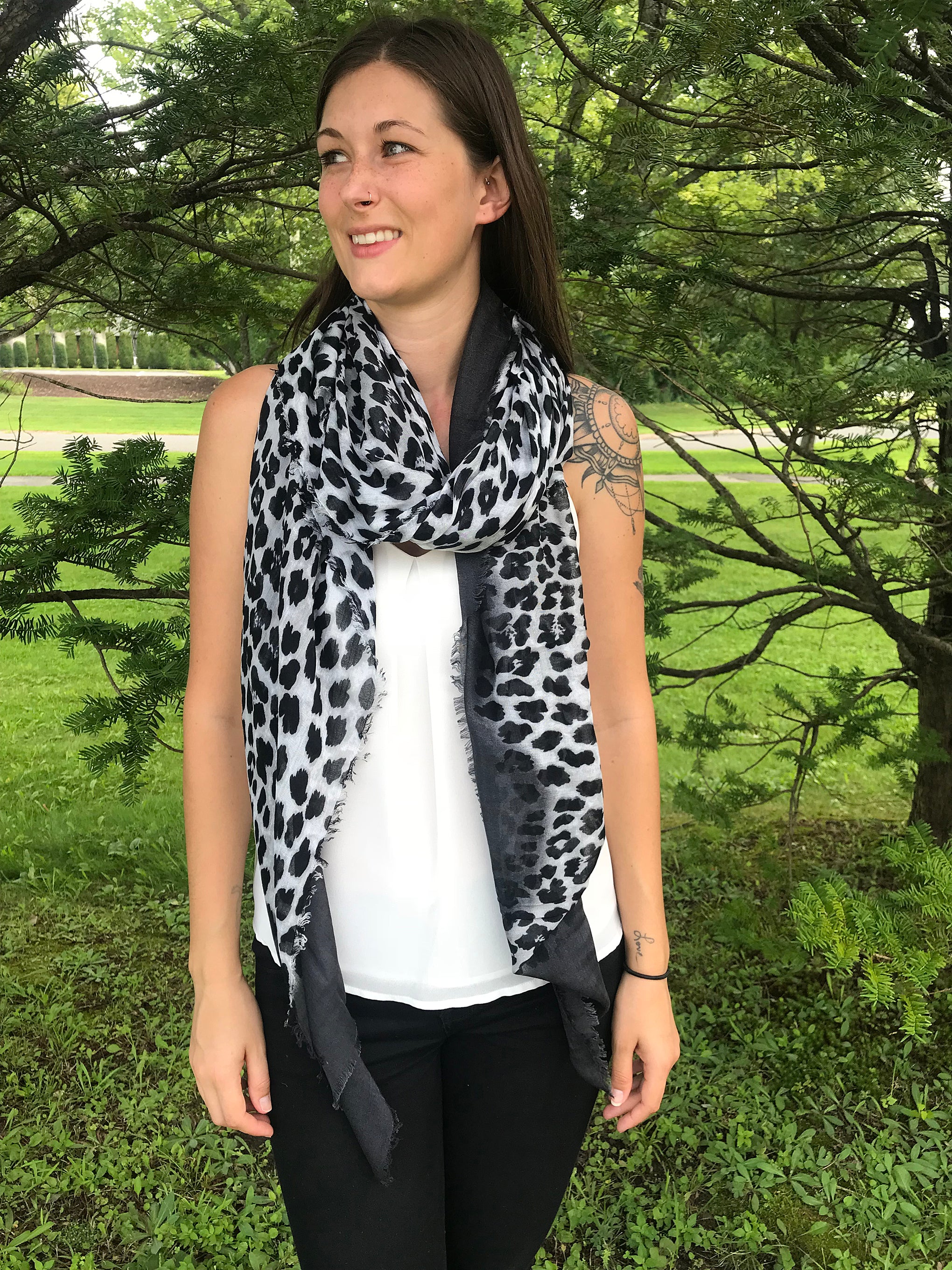 Model Wearing Blue Pacific Animal Print Cashmere and Silk Scarf in Grey Slate and White
